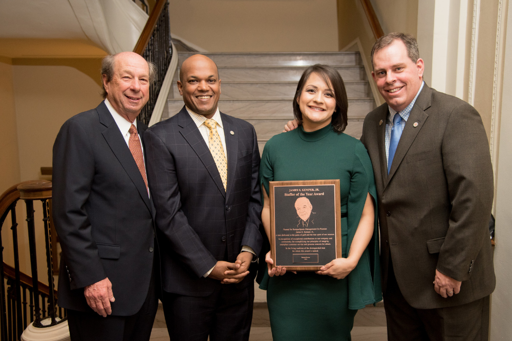 Yolanda Porras, winner of the 2018 James S. Kemper Staffer of the Year Award, pictured with Steve Lesnik, Val D'Souza and Tim Krebs