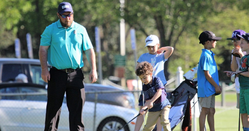 Joe Smith, PGA Head Golf Professional at Swenson Park Golf Course (Stockton, California) instructing junior golfers