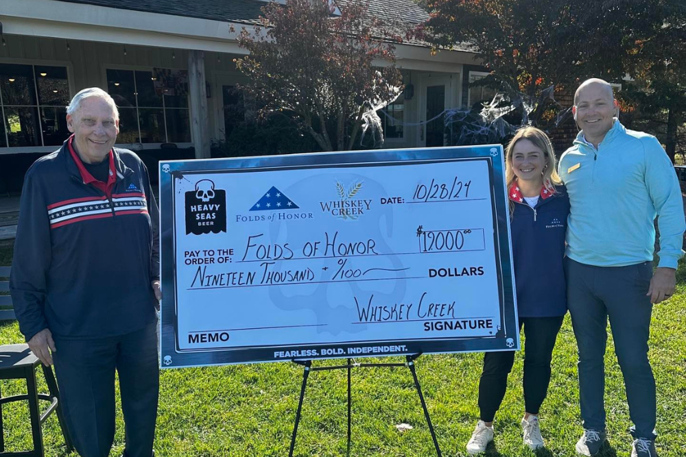 Folds of Honor check presentation at Whiskey Creek Golf Club