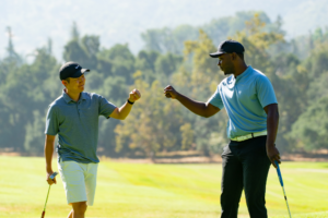 Two golfers celebrating a good round.