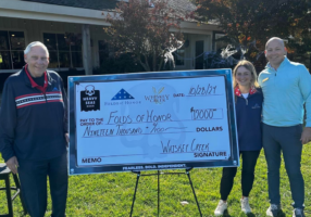 Folds of Honor check presentation at Whiskey Creek Golf Club